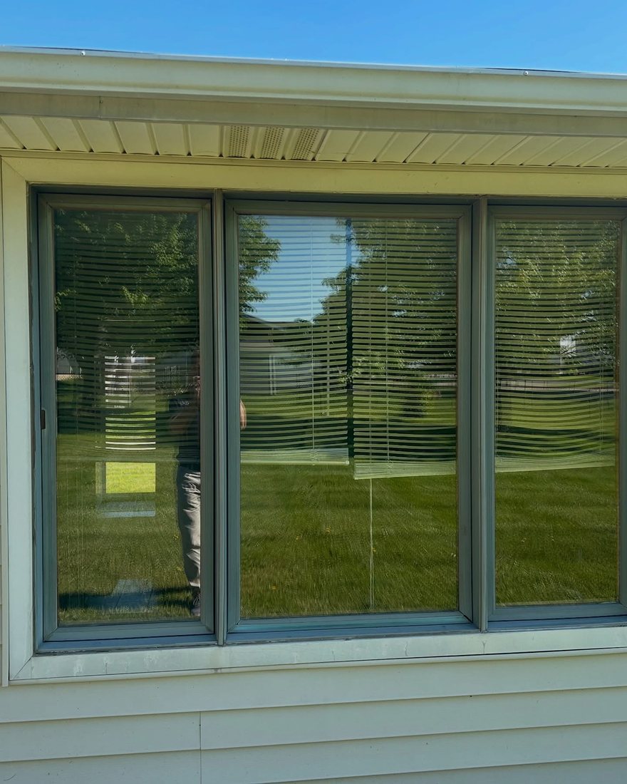 Lewisburg home before, with a flat three-panel window